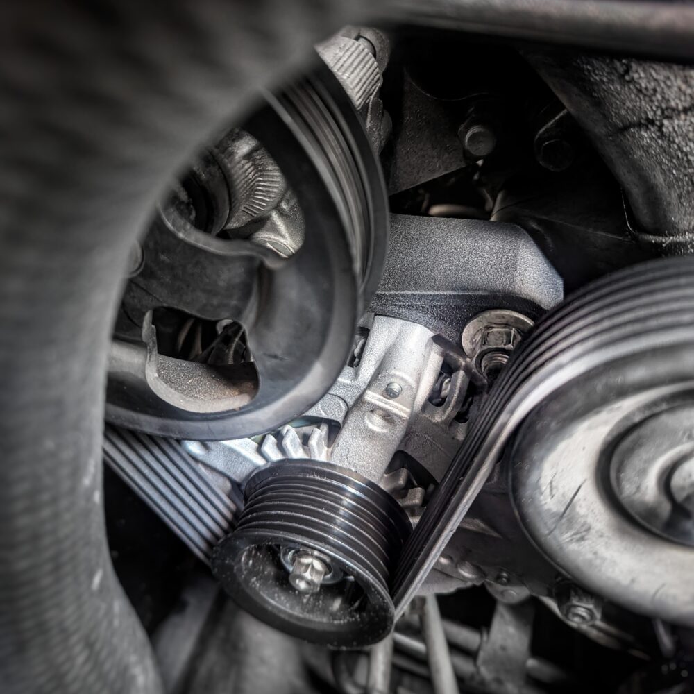 LS430 3UZ-FE Alternator Shield On Car Showing Mount Nut